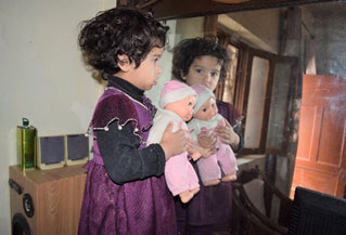 Child with doll