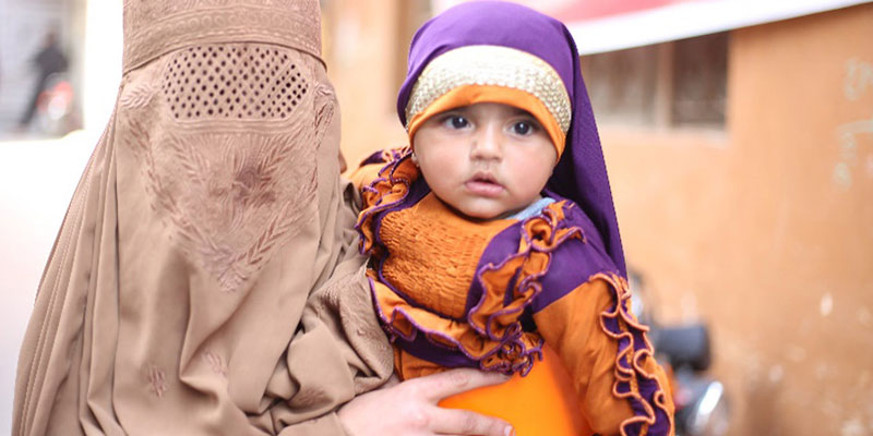 Shazia with her daughter Aasia after visiting vaccination