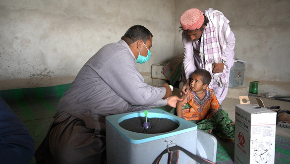 A young boy from a small remote village in Rajanpur gets the new polio vaccine. A young boy from a small remote village in Rajanpur gets the new polio vaccine.