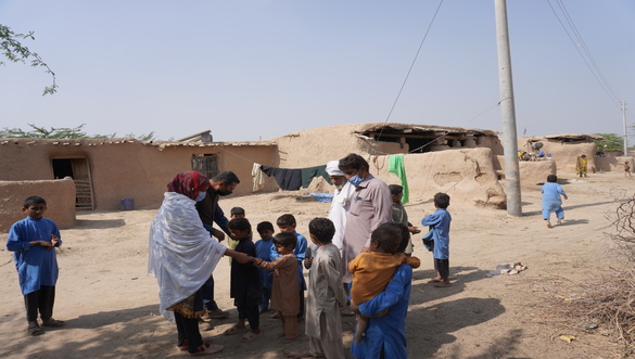 Social mobilisers bring children to a makeshift vaccination post in Dera Ghazi Khan, Punjab. Social mobilisers bring children to a makeshift vaccination post in Dera Ghazi Khan, Punjab.